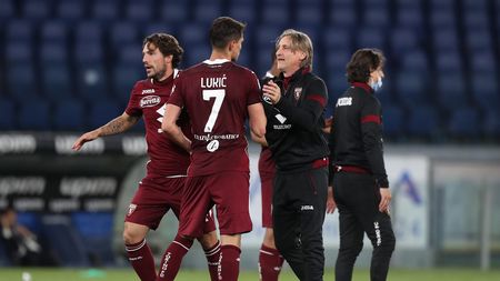 ROME, ITALY - MAY 18: Sasa Lukic of Torino FC and Davide Nicola, Head Coach of Torino FC interact following the Serie A match between SS Lazio  and Torino FC at Stadio Olimpico on May 18, 2021 in Rome, Italy. Sporting stadiums around Italy remain under strict restrictions due to the Coronavirus Pandemic as Government social distancing laws prohibit fans inside venues resulting in games being played behind closed doors. (Photo by Paolo Bruno/Getty Images)
