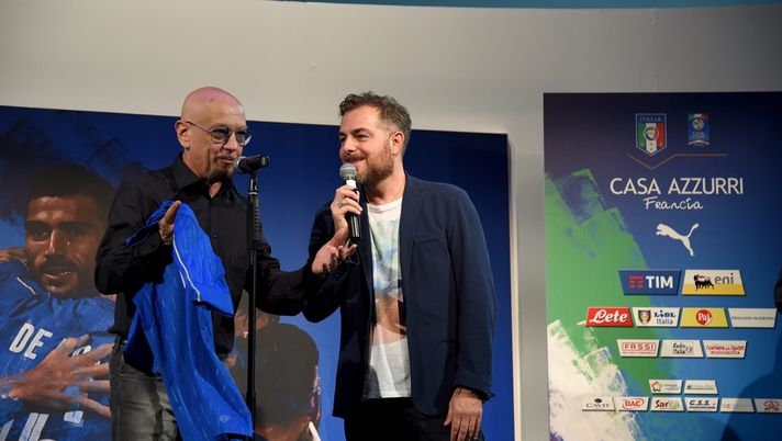 MONTPELLIER, FRANCE - JUNE 14: Enrico Ruggeri and Daniele Bossari (R) attend at Casa Azzurri on June 14, 2016 in Montpellier, France. (Photo by Claudio Villa/Getty Images) MONTPELLIER, FRANCE - JUNE 14: Enrico Ruggeri and Daniele Bossari (R) attend at Casa Azzurri on June 14, 2016 in Montpellier, France. (Photo by Claudio Villa/Getty Images)