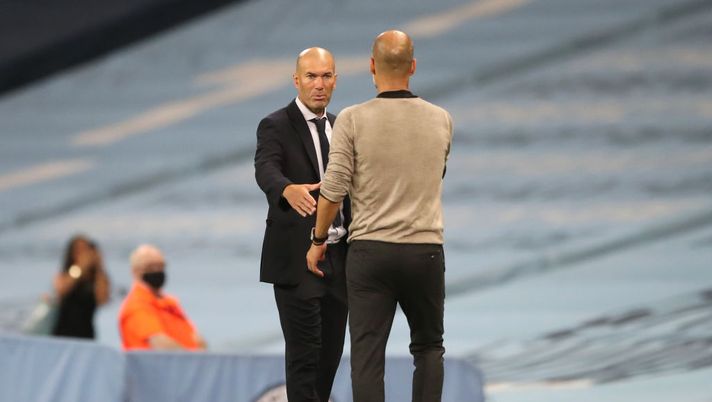 MANCHESTER, ENGLAND - AUGUST 07: Pep Guardiola, Manager of Manchester City shakes hands with Zinedine Zidane, Head Coach of Real Madrid following the UEFA Champions League round of 16 second leg match between Manchester City and Real Madrid at Etihad Stadium on August 07, 2020 in Manchester, England. (Photo by Nick Potts/Pool via Getty Images) MANCHESTER, ENGLAND - AUGUST 07: Pep Guardiola, Manager of Manchester City shakes hands with Zinedine Zidane, Head Coach of Real Madrid following the UEFA Champions League round of 16 second leg match between Manchester City and Real Madrid at Etihad Stadium on August 07, 2020 in Manchester, England. (Photo by Nick Potts/Pool via Getty Images)