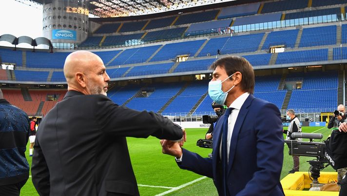 MILAN, ITALY - OCTOBER 17: Head Coach of FC Internazionale Antonio Conte shakes hands with head coach of AC Milan Stefano Pioli during the Serie A match between FC Internazionale and AC Milan at Stadio Giuseppe Meazza on October 17, 2020 in Milan, Italy. (Photo by Claudio Villa - Inter/Inter via Getty Images) MILAN, ITALY - OCTOBER 17: Head Coach of FC Internazionale Antonio Conte shakes hands with head coach of AC Milan Stefano Pioli during the Serie A match between FC Internazionale and AC Milan at Stadio Giuseppe Meazza on October 17, 2020 in Milan, Italy. (Photo by Claudio Villa - Inter/Inter via Getty Images)
