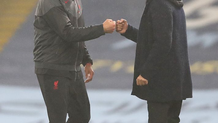 MANCHESTER, ENGLAND - NOVEMBER 08: Jurgen Klopp, Manager of Liverpool interacts with Pep Guardiola, Manager of Manchester City following the Premier League match between Manchester City and Liverpool at Etihad Stadium on November 08, 2020 in Manchester, England. Sporting stadiums around the UK remain under strict restrictions due to the Coronavirus Pandemic as Government social distancing laws prohibit fans inside venues resulting in games being played behind closed doors. (Photo by Martin Rickett - Pool/Getty Images) MANCHESTER, ENGLAND - NOVEMBER 08: Jurgen Klopp, Manager of Liverpool interacts with Pep Guardiola, Manager of Manchester City following the Premier League match between Manchester City and Liverpool at Etihad Stadium on November 08, 2020 in Manchester, England. Sporting stadiums around the UK remain under strict restrictions due to the Coronavirus Pandemic as Government social distancing laws prohibit fans inside venues resulting in games being played behind closed doors. (Photo by Martin Rickett - Pool/Getty Images)