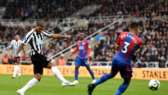 NEWCASTLE UPON TYNE, ENGLAND - APRIL 06: Deandre Yedlin of Newcastle United shoots as Patrick Van Aanholt of Crystal Palace attempts to block during the Premier League match between Newcastle United and Crystal Palace at St. James Park on April 06, 2019 in Newcastle upon Tyne, United Kingdom. (Photo by Stu Forster/Getty Images) 