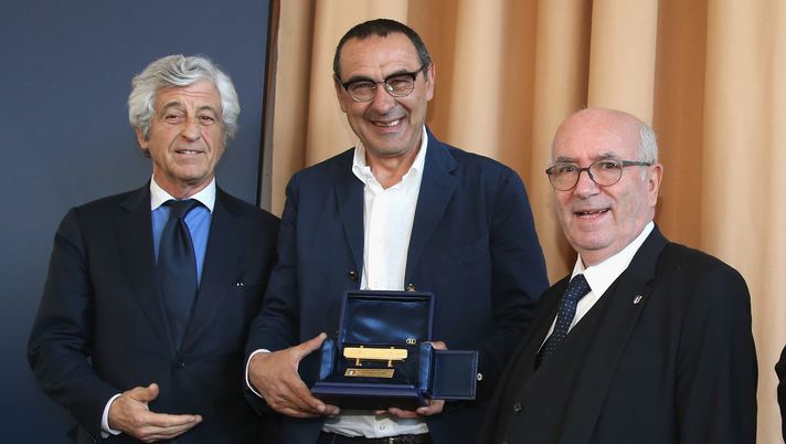 FLORENCE, ITALY - MARCH 27: Maurizio Sarri receives the Panchina D'Oro Prize during Italian Football Federation 'Panchine D'Oro E D'Argento' Prize ( in the pictture with Gianni Rivera and Carlo Tavecchio at Coverciano on March 27, 2017 in Florence, Italy. (Photo by Maurizio Lagana/Getty Images) FLORENCE, ITALY - MARCH 27: Maurizio Sarri receives the Panchina D'Oro Prize during Italian Football Federation 'Panchine D'Oro E D'Argento' Prize ( in the pictture with Gianni Rivera and Carlo Tavecchio at Coverciano on March 27, 2017 in Florence, Italy. (Photo by Maurizio Lagana/Getty Images)