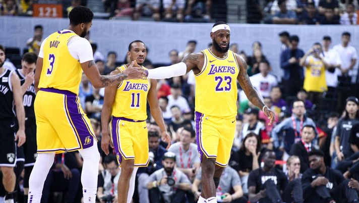 SHENZHEN, CHINA - OCTOBER 12:#23 LeBron James, #3 Anthony Davis and #11 Avery Bradley of the Los Angeles Lakers celebrate during the match against the Brooklyn Nets during a preseason game as part of 2019 NBA Global Games China at Shenzhen Universiade Center on October 12, 2019 in Shenzhen, Guangdong, China. (Photo by Zhong Zhi/Getty Images) SHENZHEN, CHINA - OCTOBER 12:#23 LeBron James, #3 Anthony Davis and #11 Avery Bradley of the Los Angeles Lakers celebrate during the match against the Brooklyn Nets during a preseason game as part of 2019 NBA Global Games China at Shenzhen Universiade Center on October 12, 2019 in Shenzhen, Guangdong, China. (Photo by Zhong Zhi/Getty Images)