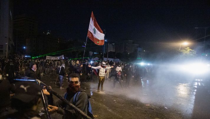 BEIRUT, LEBANON - JANUARY 25: Security forces fire a water cannon at anti-government protester near the Grand Serail on January 25, 2020 in Beirut, Lebanon. A number of marches were planned to convene on Parliament and the Union of Banks on what is the 101st day of unrest in the country, as protests continue against the ongoing financial crisis and political corruption. (Photo by Sam Tarling/Getty Images) BEIRUT, LEBANON - JANUARY 25: Security forces fire a water cannon at anti-government protester near the Grand Serail on January 25, 2020 in Beirut, Lebanon. A number of marches were planned to convene on Parliament and the Union of Banks on what is the 101st day of unrest in the country, as protests continue against the ongoing financial crisis and political corruption. (Photo by Sam Tarling/Getty Images)
