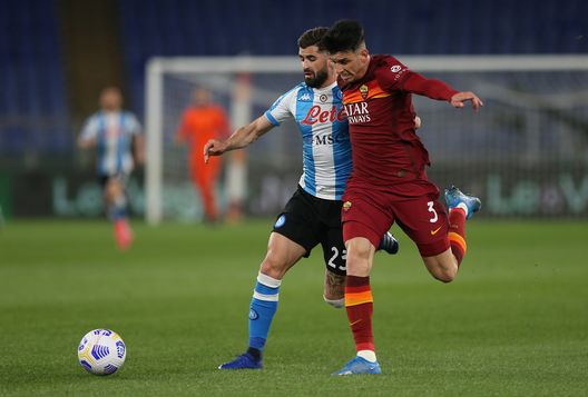 ROME, ITALY - MARCH 21: Elseid Hysaj of SSC Napoli battles for possession with Roger Ibanez of Roma during the Serie A match between AS Roma and SSC Napoli at Stadio Olimpico on March 21, 2021 in Rome, Italy. Sporting stadiums around Italy remain under strict restrictions due to the Coronavirus Pandemic as Government social distancing laws prohibit fans inside venues resulting in games being played behind closed doors. (Photo by Paolo Bruno/Getty Images) 