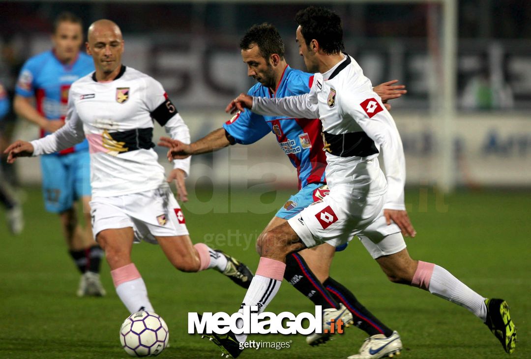  CATANIA, ITALY -  FEBRUARY 2:   Giuseppe Biava #21 and #5 Eugenio Corini of Palermo battle Giuseppe Mascara #10 of Catania Calcio for position in a Serie A match at Stadio Angelo Massimino  February 2, 2007 in Catania, Italy.  (Photo by New Press/Getty Images) 