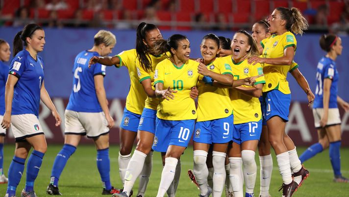 VALENCIENNES, FRANCE - JUNE 18: Marta of Brazil celebrates with teammates after scoring her team's first goal during the 2019 FIFA Women's World Cup France group C match between Italy and Brazil at Stade du Hainaut on June 18, 2019 in Valenciennes, France. (Photo by Robert Cianflone/Getty Images)  VALENCIENNES, FRANCE - JUNE 18: Marta of Brazil celebrates with teammates after scoring her team's first goal during the 2019 FIFA Women's World Cup France group C match between Italy and Brazil at Stade du Hainaut on June 18, 2019 in Valenciennes, France. (Photo by Robert Cianflone/Getty Images)