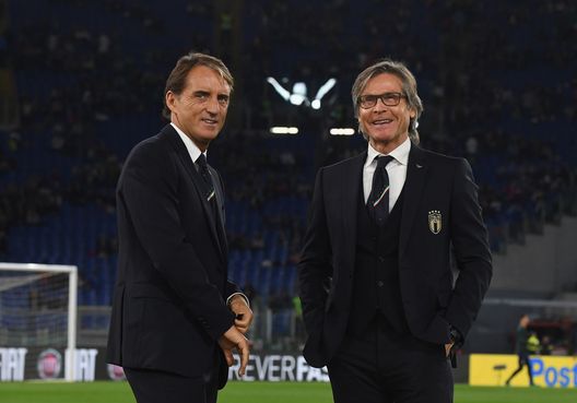 ROME, ITALY - OCTOBER 12: Head coach Italy Roberto Mancini and Team Manager Italy Gabriele Oriali chat prior to the UEFA Euro 2020 qualifier between Italy and Greece on October 12, 2019 in Rome, Italy. (Photo by Claudio Villa/Getty Images) ROME, ITALY - OCTOBER 12: Head coach Italy Roberto Mancini and Team Manager Italy Gabriele Oriali chat prior to the UEFA Euro 2020 qualifier between Italy and Greece on October 12, 2019 in Rome, Italy. (Photo by Claudio Villa/Getty Images)