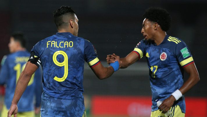 SANTIAGO, CHILE - OCTOBER 13: Radamel Falcao García of Colombia celebrates with teammate Johan Mojica after scoring the second goal of his team during a match between Chile and Colombia as part of South American Qualifiers for Qatar 2022 at Estadio Nacional de Chile on October 13, 2020 in Santiago, Chile. (Photo by Claudio Reyes - Pool/Getty Images) SANTIAGO, CHILE - OCTOBER 13: Radamel Falcao García of Colombia celebrates with teammate Johan Mojica after scoring the second goal of his team during a match between Chile and Colombia as part of South American Qualifiers for Qatar 2022 at Estadio Nacional de Chile on October 13, 2020 in Santiago, Chile. (Photo by Claudio Reyes - Pool/Getty Images)