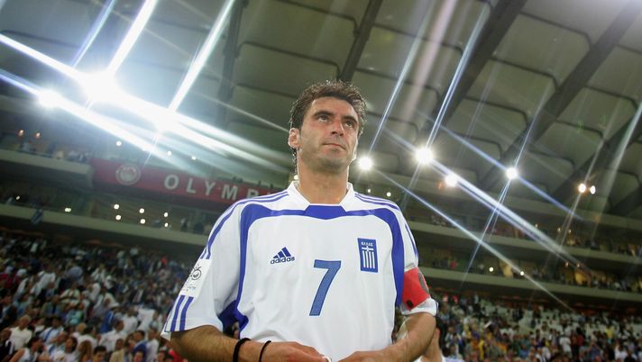 ATHENS, GREECE - JUNE 8: Theodoros Zagorakis of Greece enters the field for the kick off to the FIFA World Cup 2006 Qualifier between Greece and Ukraine on June 8, 2005 in Athens, Greece. (Photo by Alexander Hassenstein/Bongarts/Getty Images) ATHENS, GREECE - JUNE 8: Theodoros Zagorakis of Greece enters the field for the kick off to the FIFA World Cup 2006 Qualifier between Greece and Ukraine on June 8, 2005 in Athens, Greece. (Photo by Alexander Hassenstein/Bongarts/Getty Images)