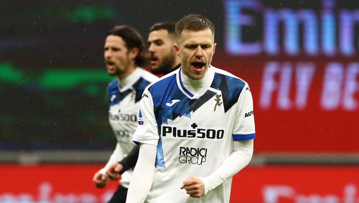 MILAN, ITALY - JANUARY 23: Josip Ilicic of Atalanta B.C. celebrates after scoring their team's second goal from the penalty spot during the Serie A match between AC Milan and Atalanta BC at Stadio Giuseppe Meazza on January 23, 2021 in Milan, Italy. Sporting stadiums around Italy remain under strict restrictions due to the Coronavirus Pandemic as Government social distancing laws prohibit fans inside venues resulting in games being played behind closed doors. (Photo by Marco Luzzani/Getty Images) La depressione: quando il peggior avversario di un atleta è se stesso- immagine 2