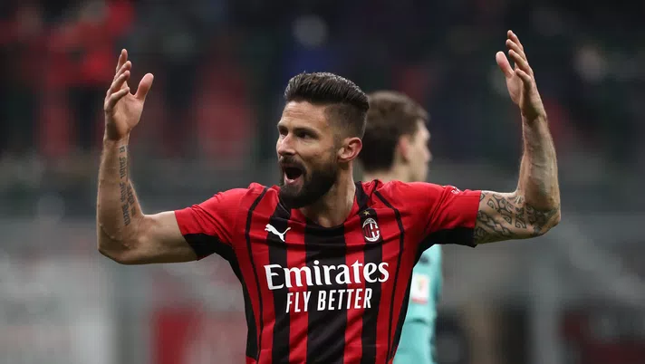 MILAN, ITALY - JANUARY 13: Olivier Giroud of AC Milan celebrates after scoring his side's opening goal during the Coppa Italia match between AC Milan and Genoa CFC at Stadio Giuseppe Meazza on January 13, 2022 in Milan, Italy. (Photo by Marco Luzzani/Getty Images)