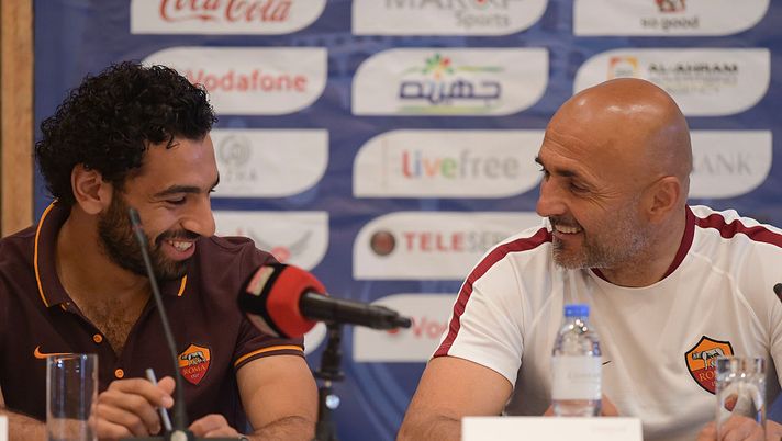 Mohamed Salah (L) and coach Luciano Spalletti attend an As Roma press conference to unveil the 2016 summer training camp at  on May 19, 2016 in Al Ain, United Arab Emirates. 