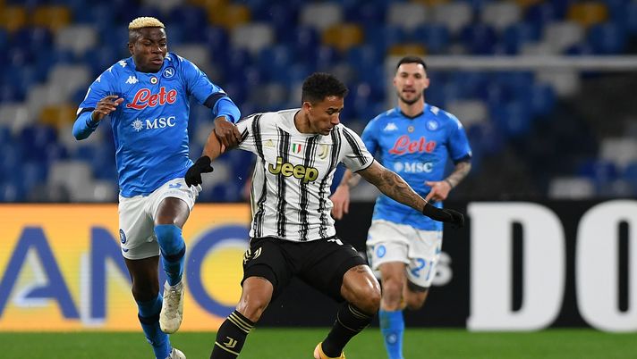 NAPLES, ITALY - FEBRUARY 13: Danilo of Juventus is challenged by Victor Osimhen of Napoli during the Serie A match between SSC Napoli and Juventus at Stadio Diego Armando Maradona on February 13, 2021 in Naples, Italy. Sporting stadiums around Italy remain under strict restrictions due to the Coronavirus Pandemic as Government social distancing laws prohibit fans inside venues resulting in games being played behind closed doors. (Photo by Francesco Pecoraro/Getty Images) NAPLES, ITALY - FEBRUARY 13: Danilo of Juventus is challenged by Victor Osimhen of Napoli during the Serie A match between SSC Napoli and Juventus at Stadio Diego Armando Maradona on February 13, 2021 in Naples, Italy. Sporting stadiums around Italy remain under strict restrictions due to the Coronavirus Pandemic as Government social distancing laws prohibit fans inside venues resulting in games being played behind closed doors. (Photo by Francesco Pecoraro/Getty Images)