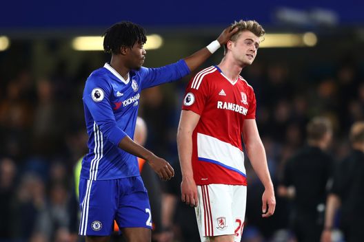  LONDON, ENGLAND - MAY 08: Nathaniel Chalobah of Chelsea consols Patrick Bamford of Middlesbrough after the game during the Premier League match between Chelsea and Middlesbrough at Stamford Bridge on May 8, 2017 in London, England. (Photo by Michael Steele/Getty Images) 