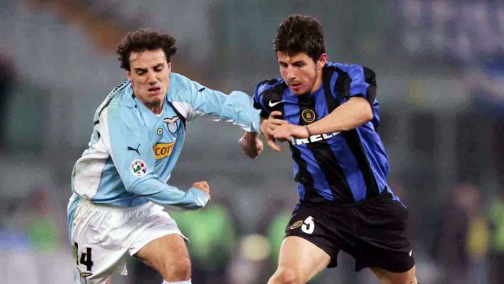 ROME - MARCH 12: Belozoglu Emre of Inter Milan struggles for the ball against Antonio Filippini of Lazio during their match March 12, 2005 in Stadio Olimpico in Rome, Italy. (Photo by New Press/Getty Images) ROME - MARCH 12: Belozoglu Emre of Inter Milan struggles for the ball against Antonio Filippini of Lazio during their match March 12, 2005 in Stadio Olimpico in Rome, Italy. (Photo by New Press/Getty Images)