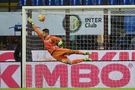 TOPSHOT - Chievo's goalkeeper from Italy Andrea Seculin makes a save during the Italian Serie A football match Inter Milan vs Chievo Verona on February 3, 2016 at the San Siro Stadium stadium in Milan. AFP PHOTO / OLIVIER MORIN / AFP / OLIVIER MORIN (Photo credit should read OLIVIER MORIN/AFP/Getty Images) Seculin