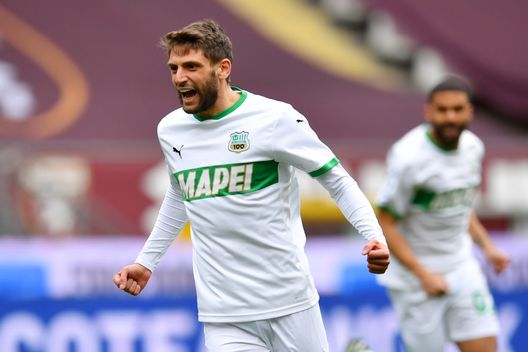 TURIN, ITALY - MARCH 17: Domenico Berardi of Sassuolo celebrates after scoring his sides first goal during the Serie A match between Torino FC and US Sassuolo at Stadio Olimpico di Torino on March 17, 2021 in Turin, Italy. Sporting stadiums around Italy remain under strict restrictions due to the Coronavirus Pandemic as Government social distancing laws prohibit fans inside venues resulting in games being played behind closed doors. (Photo by Valerio Pennicino/Getty Images) TURIN, ITALY - MARCH 17: Domenico Berardi of Sassuolo celebrates after scoring his sides first goal during the Serie A match between Torino FC and US Sassuolo at Stadio Olimpico di Torino on March 17, 2021 in Turin, Italy. Sporting stadiums around Italy remain under strict restrictions due to the Coronavirus Pandemic as Government social distancing laws prohibit fans inside venues resulting in games being played behind closed doors. (Photo by Valerio Pennicino/Getty Images)
