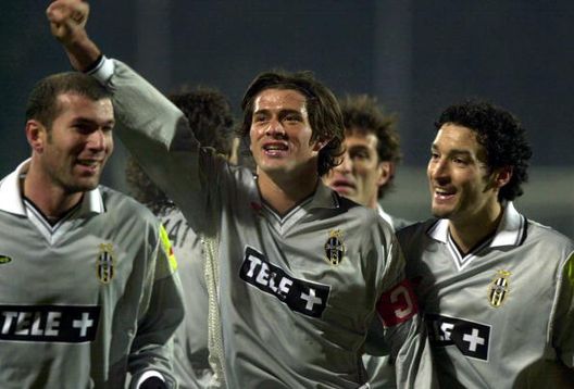 3 Feb 2001: Alessio Tacchinardi and Gianluca Zambrotta of Juventus celebrate a goal during the Atalanta v Juventus Serie A match played at the Azzurri d''Italia Stadium, Bergamo. Mandatory Credit: Grazia Neri/ALLSPORT 3 Feb 2001: Alessio Tacchinardi and Gianluca Zambrotta of Juventus celebrate a goal during the Atalanta v Juventus Serie A match played at the Azzurri d''Italia Stadium, Bergamo. Mandatory Credit: Grazia Neri/ALLSPORT