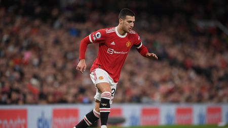 MANCHESTER, ENGLAND - MARCH 12: Diogo Dalot of Manchester United in action during the Premier League match between Manchester United and Tottenham Hotspur at Old Trafford on March 12, 2022 in Manchester, England. (Photo by Michael Regan/Getty Images) MANCHESTER, ENGLAND - MARCH 12: Diogo Dalot of Manchester United in action during the Premier League match between Manchester United and Tottenham Hotspur at Old Trafford on March 12, 2022 in Manchester, England. (Photo by Michael Regan/Getty Images)