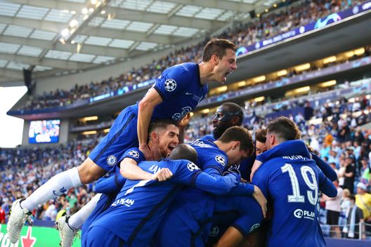 PORTO, PORTUGAL - MAY 29: Kai Havertz of Chelsea (hidden) celebrates with team mates after scoring their side's first goal during the UEFA Champions League Final between Manchester City and Chelsea FC at Estadio do Dragao on May 29, 2021 in Porto, Portugal. (Photo by Jose Coelho - Pool/Getty Images) PORTO, PORTUGAL - MAY 29: Kai Havertz of Chelsea (hidden) celebrates with team mates after scoring their side's first goal during the UEFA Champions League Final between Manchester City and Chelsea FC at Estadio do Dragao on May 29, 2021 in Porto, Portugal. (Photo by Jose Coelho - Pool/Getty Images)