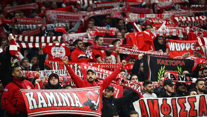 LONDON, ENGLAND - NOVEMBER 26: Olympiacos fans show their support during the UEFA Champions League group B match between Tottenham Hotspur and Olympiacos FC at Tottenham Hotspur Stadium on November 26, 2019 in London, United Kingdom. (Photo by Julian Finney/Getty Images) LONDON, ENGLAND - NOVEMBER 26: Olympiacos fans show their support during the UEFA Champions League group B match between Tottenham Hotspur and Olympiacos FC at Tottenham Hotspur Stadium on November 26, 2019 in London, United Kingdom. (Photo by Julian Finney/Getty Images)