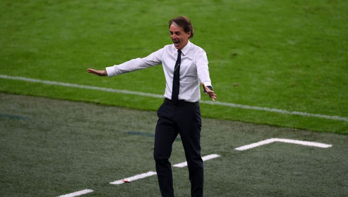 LONDON, ENGLAND - JUNE 26: Roberto Mancini, Head Coach of Italy celebrates their side's first goal scored by team mate Federico Chiesa (not pictured) during the UEFA Euro 2020 Championship Round of 16 match between Italy and Austria at Wembley Stadium at Wembley Stadium on June 26, 2021 in London, England. (Photo by Laurence Griffiths/Getty Images) LONDON, ENGLAND - JUNE 26: Roberto Mancini, Head Coach of Italy celebrates their side's first goal scored by team mate Federico Chiesa (not pictured) during the UEFA Euro 2020 Championship Round of 16 match between Italy and Austria at Wembley Stadium at Wembley Stadium on June 26, 2021 in London, England. (Photo by Laurence Griffiths/Getty Images)
