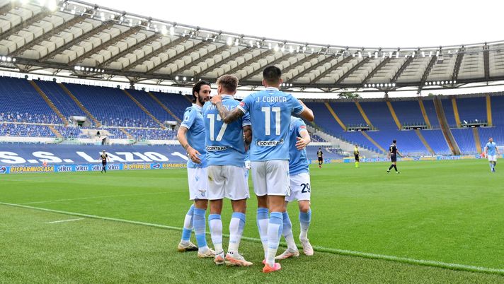 ROME, ITALY - MAY 02: Joaquin Correa of SS Lazio celebrates the opening goal with his team-mates during the Serie A match between SS Lazio and Genoa CFC at Stadio Olimpico on May 02, 2021 in Rome, Italy. Sporting stadiums around Italy remain under strict restrictions due to the Coronavirus Pandemic as Government social distancing laws prohibit fans inside venues resulting in games being played behind closed doors. (Photo by Marco Rosi - SS Lazio/Getty Images) ROME, ITALY - MAY 02: Joaquin Correa of SS Lazio celebrates the opening goal with his team-mates during the Serie A match between SS Lazio and Genoa CFC at Stadio Olimpico on May 02, 2021 in Rome, Italy. Sporting stadiums around Italy remain under strict restrictions due to the Coronavirus Pandemic as Government social distancing laws prohibit fans inside venues resulting in games being played behind closed doors. (Photo by Marco Rosi - SS Lazio/Getty Images)
