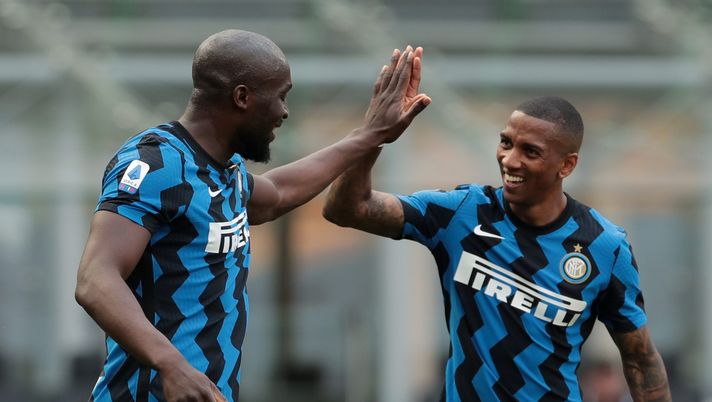MILAN, ITALY - MAY 23: Romelu Lukaku of FC Internazionale celebrates with Ashley Young after scoring their team's fifth goal during the Serie A match between FC Internazionale Milano and Udinese Calcio at Stadio Giuseppe Meazza on May 23, 2021 in Milan, Italy. Sporting stadiums around Italy remain under strict restrictions due to the Coronavirus Pandemic as Government social distancing laws prohibit fans inside venues resulting in games being played behind closed doors. (Photo by Emilio Andreoli - Inter/Inter via Getty Images) MILAN, ITALY - MAY 23: Romelu Lukaku of FC Internazionale celebrates with Ashley Young after scoring their team's fifth goal during the Serie A match between FC Internazionale Milano and Udinese Calcio at Stadio Giuseppe Meazza on May 23, 2021 in Milan, Italy. Sporting stadiums around Italy remain under strict restrictions due to the Coronavirus Pandemic as Government social distancing laws prohibit fans inside venues resulting in games being played behind closed doors. (Photo by Emilio Andreoli - Inter/Inter via Getty Images)