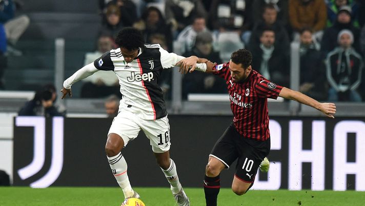 Juventus-Milan, Juan Cuadrado contro Hakan Calhanoglu (credits: GETTY Images) Juventus-Milan, Juan Cuadrado contro Hakan Calhanoglu (credits: GETTY Images)