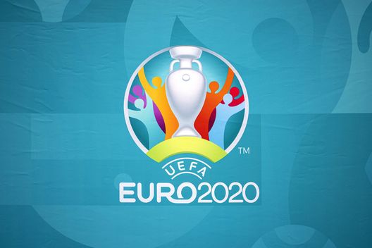 LONDON, ENGLAND - JUNE 04: The UEFA Euro 2020 logo is seen at an event outside King's Cross Railway Station as the UEFA Euro 2020 trophy arrives in London 04, 2021 in London, England. The Mayor of London welcomed the Henri Delaunay trophy to the capital today, one week before UEFA EURO 2020, which was postponed from last year due to the Covid-19 pandemic, kicks off as the UEFA Euro 2020 trophy arrives in London 11. London is one of 11 cities to host matches throughout the tournament, including the final which will be held at Wembley Stadium. It is hoped that the event will aid the city's economic recovery as the United Kingdom seeks to emerge from the coronavirus pandemic. (Photo by Rob Pinney/Getty Images) LONDON, ENGLAND - JUNE 04: The UEFA Euro 2020 logo is seen at an event outside King's Cross Railway Station as the UEFA Euro 2020 trophy arrives in London 04, 2021 in London, England. The Mayor of London welcomed the Henri Delaunay trophy to the capital today, one week before UEFA EURO 2020, which was postponed from last year due to the Covid-19 pandemic, kicks off as the UEFA Euro 2020 trophy arrives in London 11. London is one of 11 cities to host matches throughout the tournament, including the final which will be held at Wembley Stadium. It is hoped that the event will aid the city's economic recovery as the United Kingdom seeks to emerge from the coronavirus pandemic. (Photo by Rob Pinney/Getty Images)