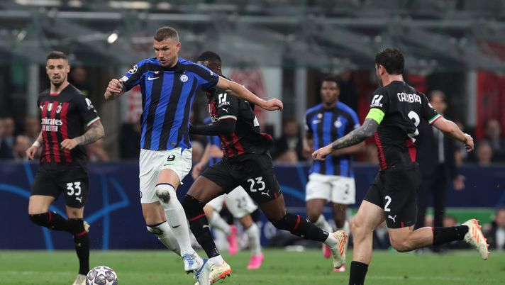 MILAN, ITALY - MAY 10: Edin Dzeko of FC Internazionale battles for the ball with Davide Calabria of AC Milan during the UEFA Champions League semi-final first leg match between AC Milan and FC Internazionale at San Siro on May 10, 2023 in Milan, Italy. (Photo by Emilio Andreoli - Inter/Inter via Getty Images) Verso Inter-Milan, queste le possibili chiavi del big match europeo - immagine 1