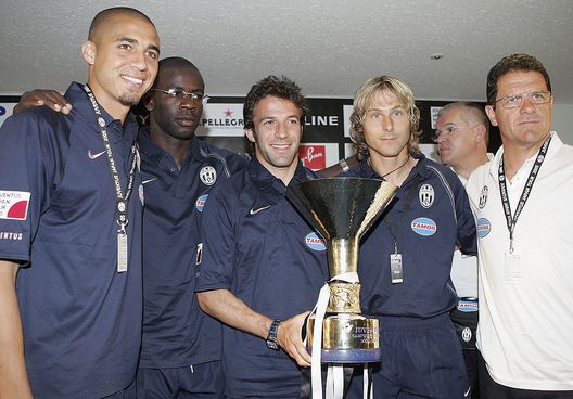 YOKOHAMA, JAPAN - MAY 31: (R-L) Juventus coach Fabio Capello, marketing director Romy Gay, midfielder Pavel Nedved, captain Alessandro Del Piero, defender Lilian Thuram, forward David Trezeguet pose with Italian soccer championship trophy during a news conference at Nissan Stadium on May 31, 2005. Juventus will play two games against Yokohama F. Marinos in Japan. (Photo by Koichi Kamoshida/Getty Images)