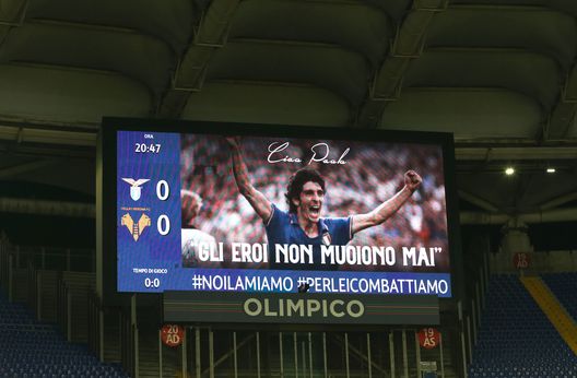 ROME, ITALY - DECEMBER 12: The LED board displays a picture of the deceased Paolo Rossi as players from both teams participate in a silence prior to the Serie A match between SS Lazio and Hellas Verona FC at Stadio Olimpico on December 12, 2020 in Rome, Italy. Sporting stadiums around Italy remain under strict restrictions due to the Coronavirus Pandemic as Government social distancing laws prohibit fans inside venues resulting in games being played behind closed doors. (Photo by Paolo Bruno/Getty Images) ROME, ITALY - DECEMBER 12: The LED board displays a picture of the deceased Paolo Rossi as players from both teams participate in a silence prior to the Serie A match between SS Lazio and Hellas Verona FC at Stadio Olimpico on December 12, 2020 in Rome, Italy. Sporting stadiums around Italy remain under strict restrictions due to the Coronavirus Pandemic as Government social distancing laws prohibit fans inside venues resulting in games being played behind closed doors. (Photo by Paolo Bruno/Getty Images)