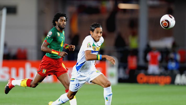 ANGOLA, LUBANGO - JANUARY 13: Alexandre Song of Cameroon and Ernest Akouassaga of Gabon during the Africa Cup of Nations match between Cameroon and Gabon from the Alto da Chela Stadium on January 13, 2010 in Lubango, Angola. (Photo by Lefty Shivambu/Gallo Images) ANGOLA, LUBANGO - JANUARY 13: Alexandre Song of Cameroon and Ernest Akouassaga of Gabon during the Africa Cup of Nations match between Cameroon and Gabon from the Alto da Chela Stadium on January 13, 2010 in Lubango, Angola. (Photo by Lefty Shivambu/Gallo Images)