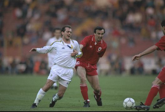 12 May 1993: Stefano Cuoghi (left) of Parma is tackled by Dragan Jokovljevic (right) of Antwerp during the European Cup Winners Cup Final match at Wembley Stadium in London. Parma won the match 3-1. Mandatory Credit: Shaun Botterill/Allsport 12 May 1993: Stefano Cuoghi (left) of Parma is tackled by Dragan Jokovljevic (right) of Antwerp during the European Cup Winners Cup Final match at Wembley Stadium in London. Parma won the match 3-1. Mandatory Credit: Shaun Botterill/Allsport