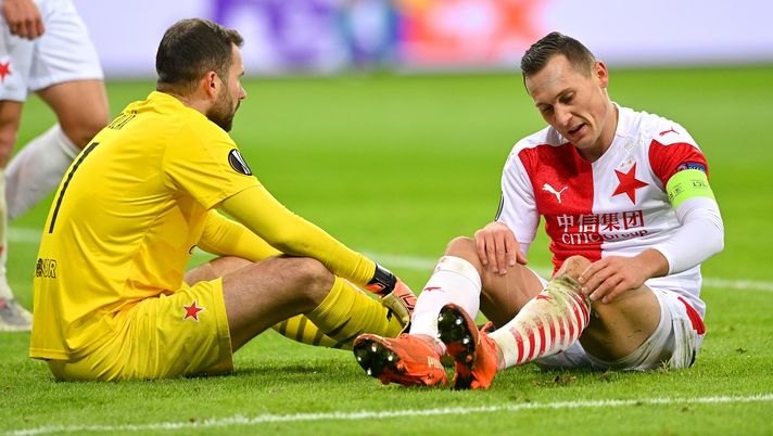 LEVERKUSEN, GERMANY - DECEMBER 10: Ondrej Kolar and Jan Boril of Slavia Praha react after their team conceded the third goal during the UEFA Europa League Group C stage match between Bayer 04 Leverkusen and Slavia Praha at BayArena on December 10, 2020 in Leverkusen, Germany. Sporting stadiums around Germany remain under strict restrictions due to the Coronavirus Pandemic as Government social distancing laws prohibit fans inside venues resulting in games being played behind closed doors. (Photo by Sascha Steinbach - Pool/Getty Images) LEVERKUSEN, GERMANY - DECEMBER 10: Ondrej Kolar and Jan Boril of Slavia Praha react after their team conceded the third goal during the UEFA Europa League Group C stage match between Bayer 04 Leverkusen and Slavia Praha at BayArena on December 10, 2020 in Leverkusen, Germany. Sporting stadiums around Germany remain under strict restrictions due to the Coronavirus Pandemic as Government social distancing laws prohibit fans inside venues resulting in games being played behind closed doors. (Photo by Sascha Steinbach - Pool/Getty Images)
