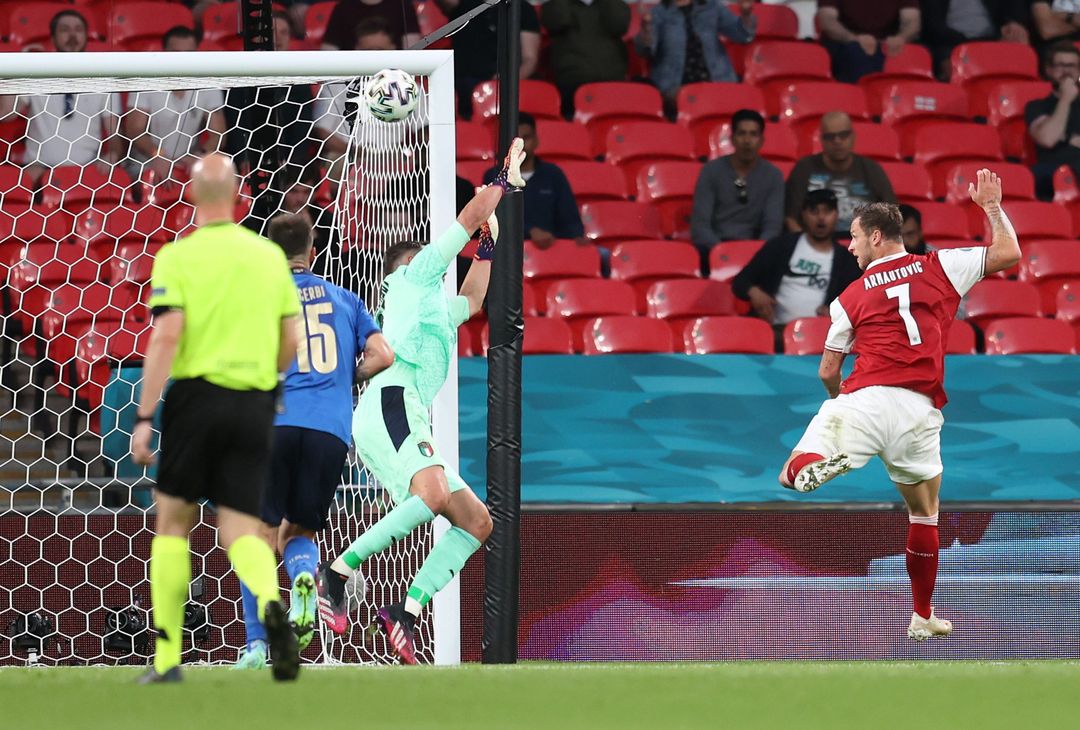  LONDON, ENGLAND - JUNE 26: Marko Arnautovic of Austria scores a goal past Gianluigi Donnarumma of Italy that was later disallowed by VAR for offside during the UEFA Euro 2020 Championship Round of 16 match between Italy and Austria at Wembley Stadium at Wembley Stadium on June 26, 2021 in London, England. (Photo by Catherine Ivill/Getty Images)  
