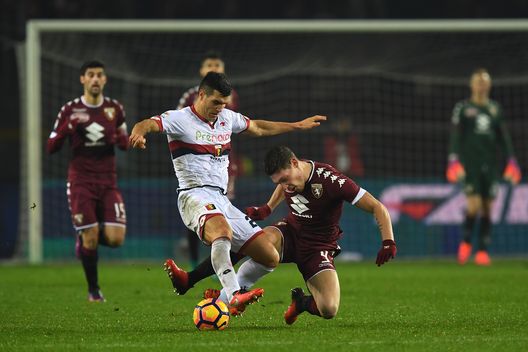 TURIN, ITALY - DECEMBER 22: Andrea Belotti (R) of FC Torino is tackled by Ezequiel Munoz of Genoa CFC during the Serie A match between FC Torino and Genoa CFC at Stadio Olimpico di Torino on December 22, 2016 in Turin, Italy. (Photo by Valerio Pennicino/Getty Images) TURIN, ITALY - DECEMBER 22: Andrea Belotti (R) of FC Torino is tackled by Ezequiel Munoz of Genoa CFC during the Serie A match between FC Torino and Genoa CFC at Stadio Olimpico di Torino on December 22, 2016 in Turin, Italy. (Photo by Valerio Pennicino/Getty Images)