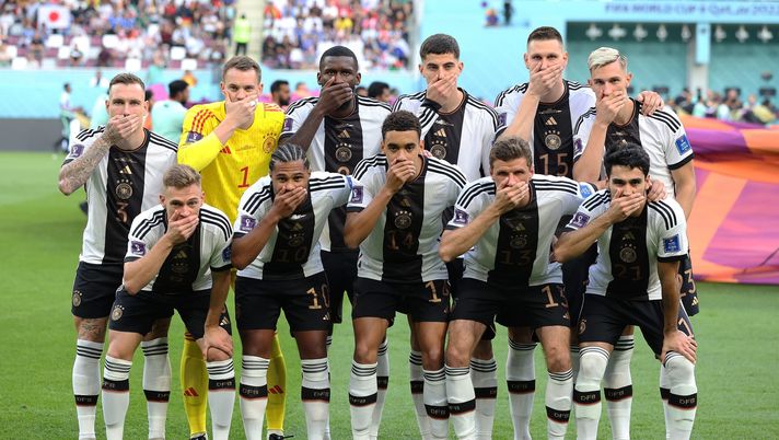 DOHA, QATAR - NOVEMBER 23: Germany players pose with their hands covering their mouths as they line up for the team photos prior to the FIFA World Cup Qatar 2022 Group E match between Germany and Japan at Khalifa International Stadium on November 23, 2022 in Doha, Qatar. (Photo by Alexander Hassenstein/Getty Images) qatar2022