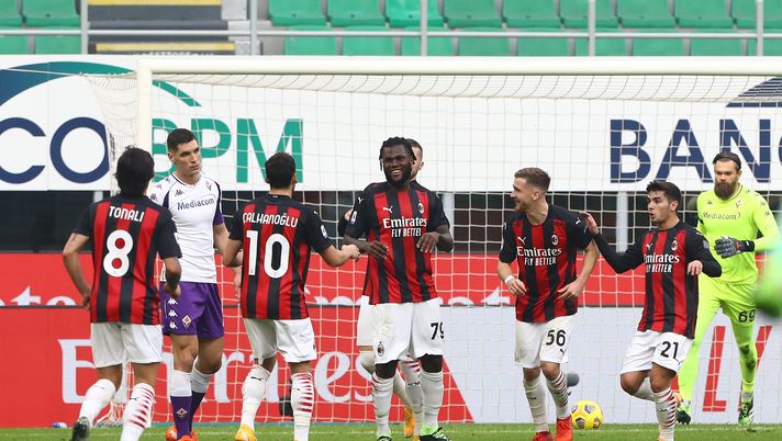MILAN, ITALY - NOVEMBER 29: Franck Kessie of AC Milan celebrates with team mates after scoring their sides second goal from the penalty spot during the Serie A match between AC Milan and ACF Fiorentina at Stadio Giuseppe Meazza on November 29, 2020 in Milan, Italy. Sporting stadiums around Italy remain under strict restrictions due to the Coronavirus Pandemic as Government social distancing laws prohibit fans inside venues resulting in games being played behind closed doors. (Photo by Marco Luzzani/Getty Images) MILAN, ITALY - NOVEMBER 29: Franck Kessie of AC Milan celebrates with team mates after scoring their sides second goal from the penalty spot during the Serie A match between AC Milan and ACF Fiorentina at Stadio Giuseppe Meazza on November 29, 2020 in Milan, Italy. Sporting stadiums around Italy remain under strict restrictions due to the Coronavirus Pandemic as Government social distancing laws prohibit fans inside venues resulting in games being played behind closed doors. (Photo by Marco Luzzani/Getty Images)