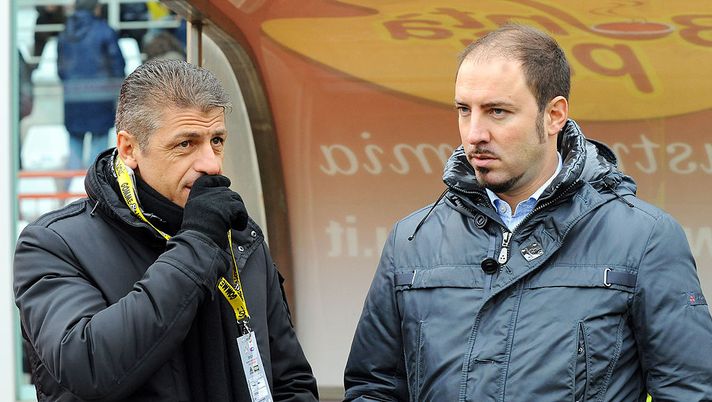 CESENA, ITALY - DECEMBER 05:  Igor Campedelli President and Owner of Cesena speaks with Ruggero Rizzitelli before the Serie A match between Cesena and Bologna at Dino Manuzzi Stadium on December 5, 2010 in Cesena, Italy.  (Photo by Roberto Serra/Getty Images) 