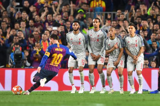 BARCELONA, SPAIN - MAY 01: Lionel Messi of Barcelona scores a free-kick to make it 3-0 during the UEFA Champions League Semi Final first leg match between Barcelona and Liverpool at the Nou Camp on May 01, 2019 in Barcelona, Spain. (Photo by Michael Regan/Getty Images) BARCELONA, SPAIN - MAY 01: Lionel Messi of Barcelona scores a free-kick to make it 3-0 during the UEFA Champions League Semi Final first leg match between Barcelona and Liverpool at the Nou Camp on May 01, 2019 in Barcelona, Spain. (Photo by Michael Regan/Getty Images)