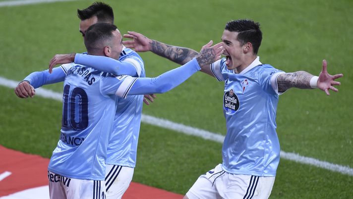 BILBAO, SPAIN - DECEMBER 04: Iago Aspas #10 of Celta de Vigo celebrates his team's second goal with teammates Santi Mina (R) and Brais Mendez during the La Liga Santander match between Athletic Club and RC Celta at Estadio de San Mames on December 04, 2020 in Bilbao, Spain. Sporting stadiums around Spain remain under strict restrictions due to the Coronavirus Pandemic as Government social distancing laws prohibit fans inside venues resulting in games being played behind closed doors. (Photo by Juan Manuel Serrano Arce/Getty Images) BILBAO, SPAIN - DECEMBER 04: Iago Aspas #10 of Celta de Vigo celebrates his team's second goal with teammates Santi Mina (R) and Brais Mendez during the La Liga Santander match between Athletic Club and RC Celta at Estadio de San Mames on December 04, 2020 in Bilbao, Spain. Sporting stadiums around Spain remain under strict restrictions due to the Coronavirus Pandemic as Government social distancing laws prohibit fans inside venues resulting in games being played behind closed doors. (Photo by Juan Manuel Serrano Arce/Getty Images)