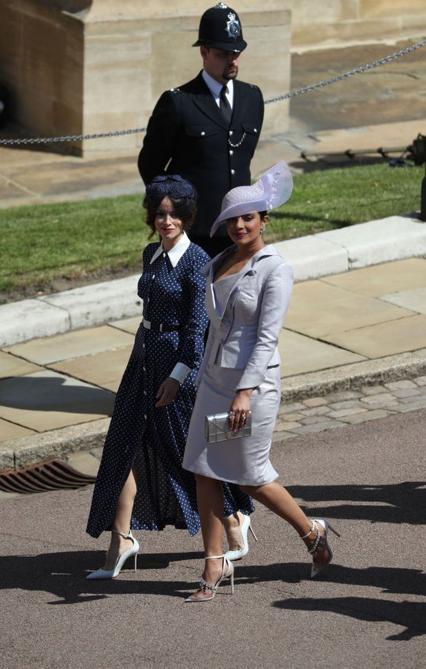 WINDSOR, UNITED KINGDOM - MAY 19: Suits actress Abigail Leigh Spencer and Bollywood actress Priyanka Chopra (right) arrive for the wedding ceremony of Britain's Prince Harry and US actress Meghan Markle at St George's Chapel, Windsor Castle on May 19, 2018 in Windsor, England. (Photo by Andrew Milligan - WPA Pool/Getty Images) WINDSOR, UNITED KINGDOM - MAY 19: Suits actress Abigail Leigh Spencer and Bollywood actress Priyanka Chopra (right) arrive for the wedding ceremony of Britain's Prince Harry and US actress Meghan Markle at St George's Chapel, Windsor Castle on May 19, 2018 in Windsor, England. (Photo by Andrew Milligan - WPA Pool/Getty Images)