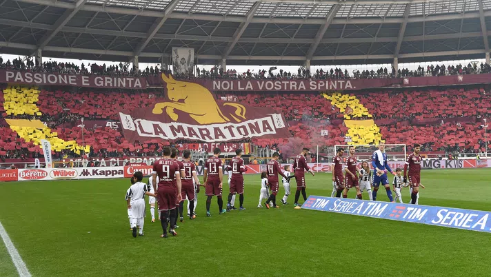 TURIN, ITALY - DECEMBER 11:  Fans of FC Torino show a giant banner during the Serie A match between FC Torino and Juventus FC at Stadio Olimpico di Torino on December 11, 2016 in Turin, Italy.  (Photo by Valerio Pennicino/Getty Images)