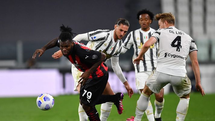 TURIN, ITALY - MAY 09: Franck Kessie of A.C. Milan is challenged by Adrien Rabiot of Juventus during the Serie A match between Juventus and AC Milan at on May 09, 2021 in Turin, Italy. Sporting stadiums around Italy remain under strict restrictions due to the Coronavirus Pandemic as Government social distancing laws prohibit fans inside venues resulting in games being played behind closed doors. (Photo by Valerio Pennicino/Getty Images) TURIN, ITALY - MAY 09: Franck Kessie of A.C. Milan is challenged by Adrien Rabiot of Juventus during the Serie A match between Juventus and AC Milan at on May 09, 2021 in Turin, Italy. Sporting stadiums around Italy remain under strict restrictions due to the Coronavirus Pandemic as Government social distancing laws prohibit fans inside venues resulting in games being played behind closed doors. (Photo by Valerio Pennicino/Getty Images)