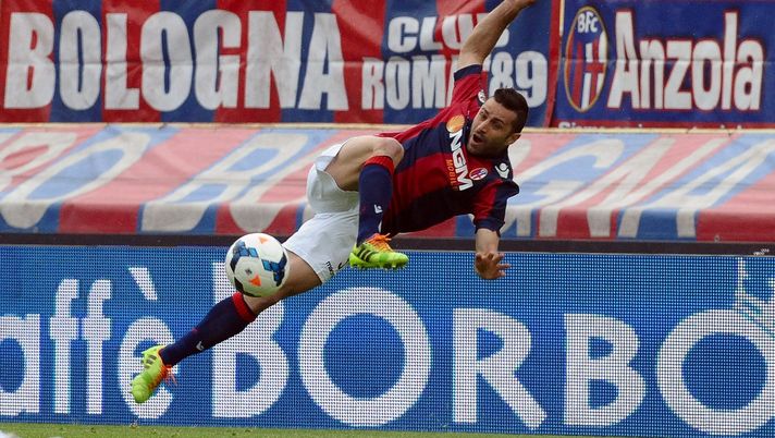 BOLOGNA, ITALY - APRIL 13: Archimede Morleo # 3 of Bologna FC in action during the Serie A match between Bologna FC and Parma FC at Stadio Renato Dall'Ara on April 13, 2014 in Bologna, Italy. (Photo by Mario Carlini / Iguana Press/Getty Images)