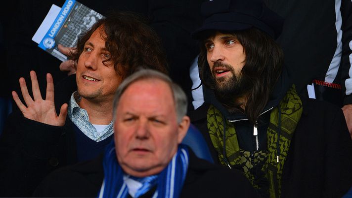 PETERBOROUGH, ENGLAND - FEBRUARY 09:  Leicester fan and musician from the band Kasabian Sergio Pizzorno (R) looks on from the directors box during the npower Championship match between Peterborough United and Leicester City at London Road Stadium on February 9, 2013 in Peterborough, England.  (Photo by Michael Regan/Getty Images) 